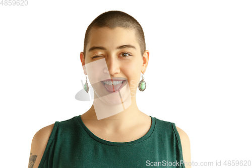 Image of Portrait of young woman with freaky appearance on white background