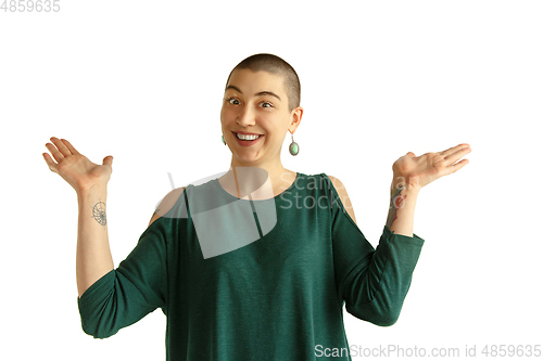 Image of Portrait of young woman with freaky appearance on white background