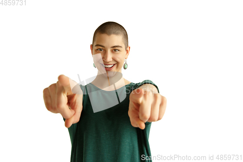 Image of Portrait of young woman with freaky appearance on white background