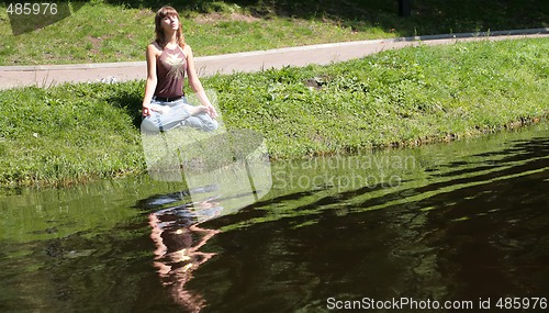 Image of meditating girl