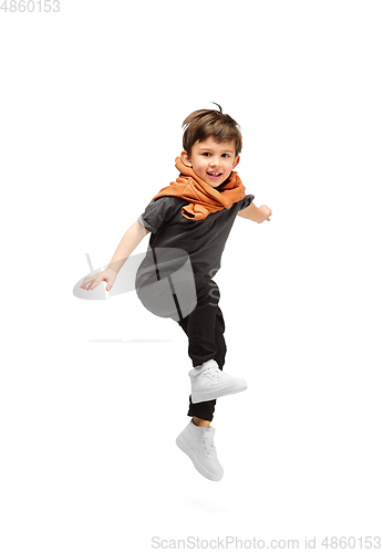 Image of Happy caucasian little boy isolated on white studio background. Looks happy, cheerful, sincere. Copyspace. Childhood, education, emotions concept