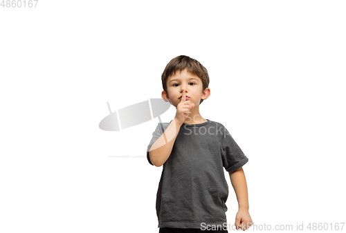 Image of Happy caucasian little boy isolated on white studio background. Looks happy, cheerful, sincere. Copyspace. Childhood, education, emotions concept