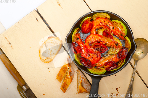 Image of roasted shrimps with zucchini and tomatoes