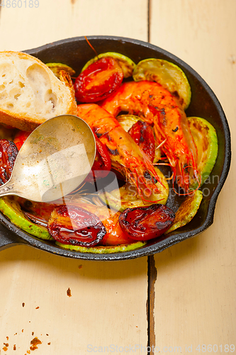 Image of roasted shrimps with zucchini and tomatoes