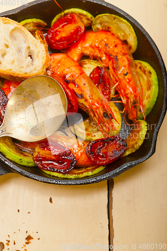 Image of roasted shrimps with zucchini and tomatoes