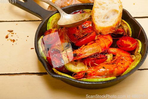 Image of roasted shrimps with zucchini and tomatoes