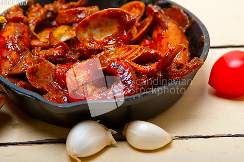 Image of fresh seafoos stew on an iron skillet