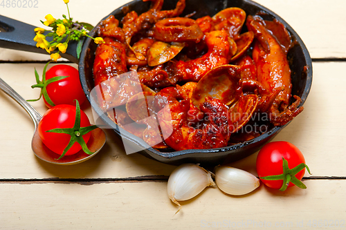 Image of fresh seafoos stew on an iron skillet