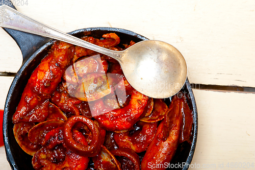 Image of fresh seafoos stew on an iron skillet