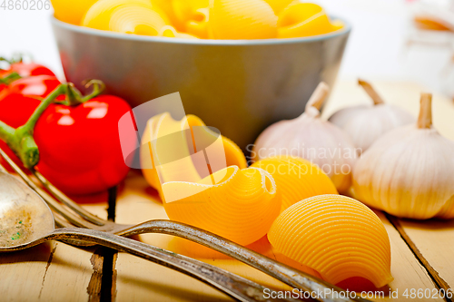 Image of Italian snail lumaconi pasta with tomatoes