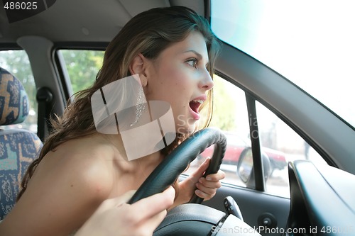 Image of emotional brunette driver