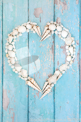 Image of Heart Shaped Seashell Wreath on Rustic Wood