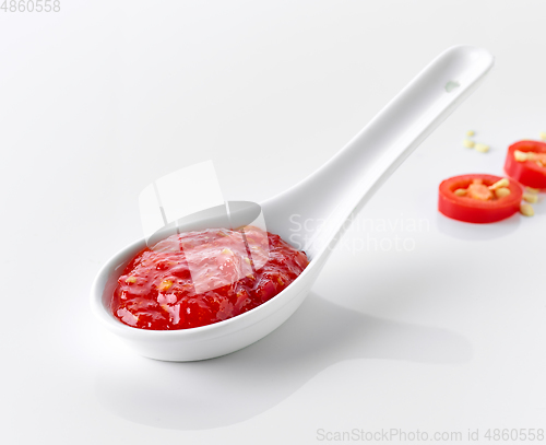 Image of spoon of hot chili sauce