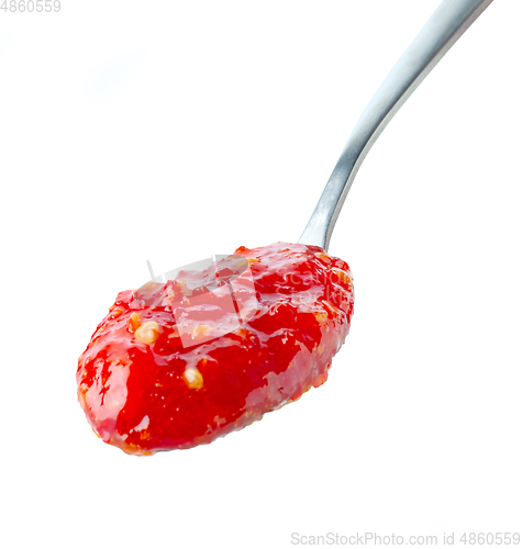 Image of red hot chili pepper sauce