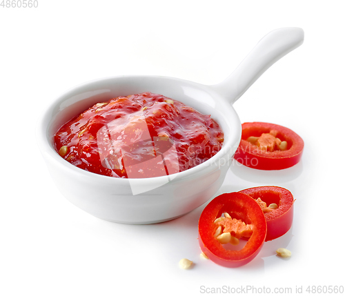 Image of red hot chili pepper sauce