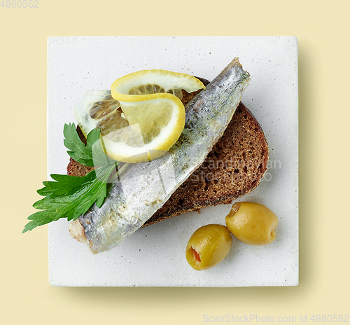 Image of plate of sandwich with canned sardine