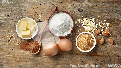 Image of baking ingredients on wooden table