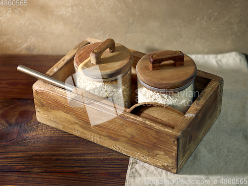 Image of product storage jars in a wooden box