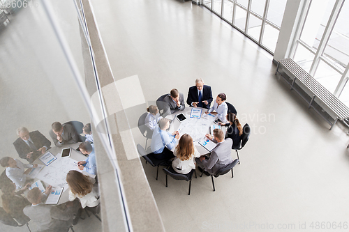 Image of business team with scheme meeting at office