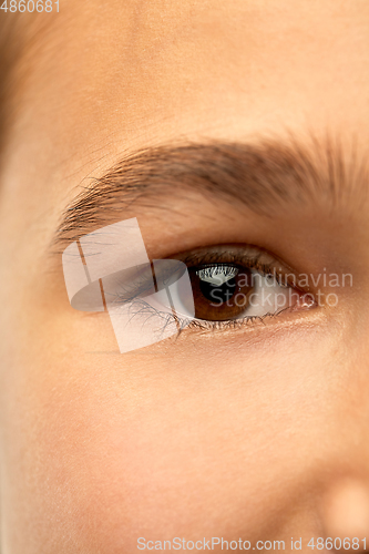 Image of close up of brown-eyed teenage girl face