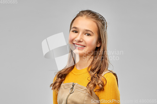 Image of portrait of smiling teenage girl