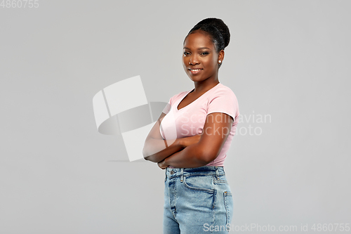 Image of confident african american woman with crossed arms
