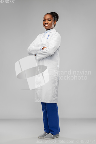 Image of happy african american female doctor or scientist