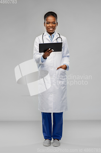 Image of african american female doctor with tablet pc