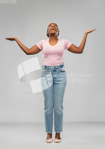 Image of happy african american woman celebrating success