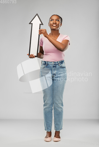 Image of african woman with upwards arrow