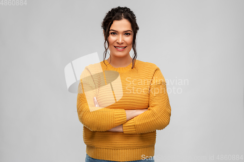 Image of happy smiling young woman with pierced nose