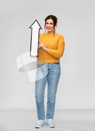 Image of smiling young woman with big white upward arrow