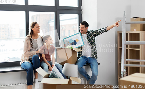 Image of happy family with child moving to new home