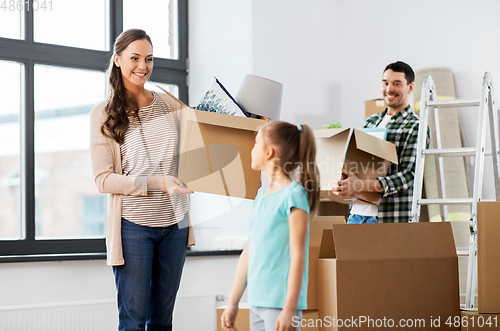 Image of happy family with child moving to new home