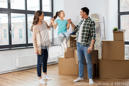 Image of happy family with child moving to new home