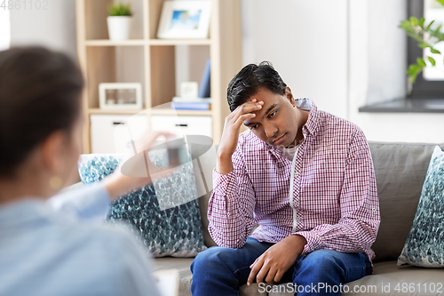 Image of man and psychologist at psychotherapy session