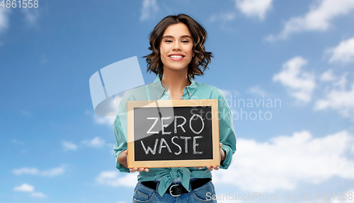 Image of happy woman with chalkboard with zero waste words