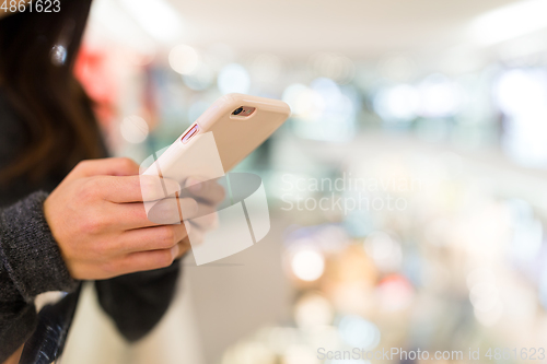 Image of Woman use of mobile phone