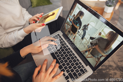 Image of Young friends, women using gadgets to watch cinema, photos, online courses, taking selfie or vlog
