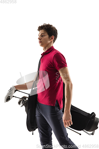 Image of Golf player in a red shirt training, practicing isolated on white studio background