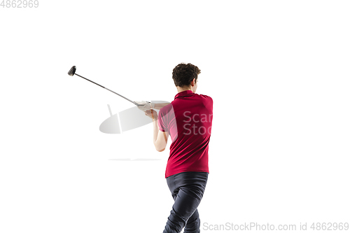 Image of Golf player in a red shirt taking a swing isolated on white studio background