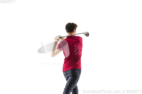 Image of Golf player in a red shirt taking a swing isolated on white studio background