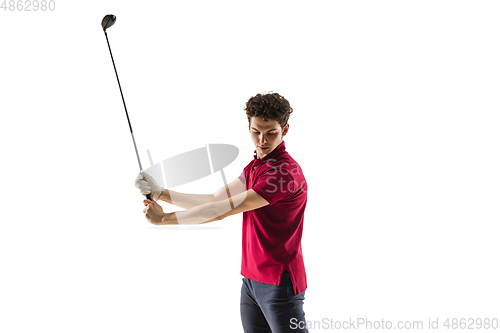 Image of Golf player in a red shirt taking a swing isolated on white studio background