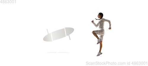 Image of Young caucasian female model in action, motion isolated on white background. Concept of sport, movement, energy and dynamic, healthy lifestyle. Training, practicing.