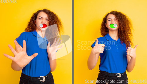 Image of Mood switch on female face. Happy and angry, splitting personality. Modern interface and human emotions