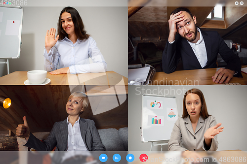 Image of Young colleagues talking, working in videoconference with co-workers at office or living room. Online business, education during quarantine.