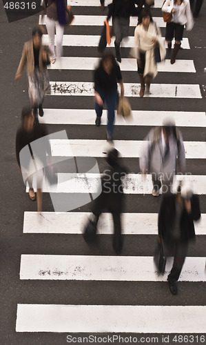 Image of People crossing the street