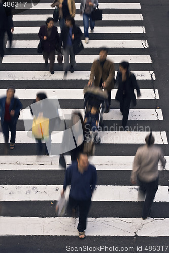 Image of People crossing the street