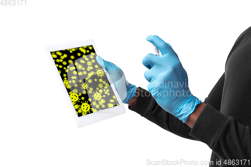 Image of Viruses on surfaces, tablet you contacting everyday - concept of spreading of virus, disinfection