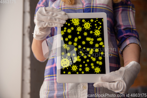 Image of Viruses on surfaces, tablet you contacting everyday - concept of spreading of virus, disinfection